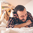 Man with happy dog 