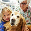 child with therapy dog