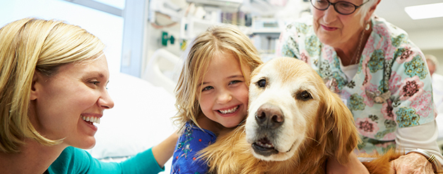 child with therapy dog