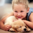 girl and puppy