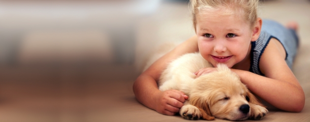 girl and puppy